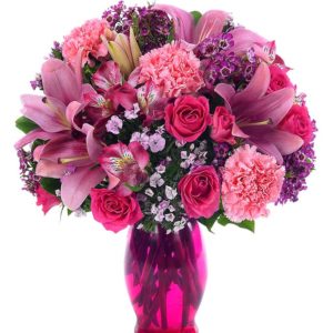 The Rose’ Sepals Bouquet flourished with Pink Lilies, Pink Spray Roses, Pink Carnations & Alstroemeria