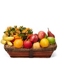 Kalanchoe Florals and Fruiterer - A Fruit Basket wth varieties of fruits in it