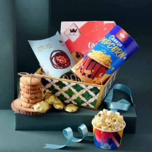 Delicious Surprise Hamper with Handmade Chocolate Almond Rocks , Oven Fresh Shahi Namkeen Cookies , Cheese PopCorn Can in Designer Handcrafted Tray