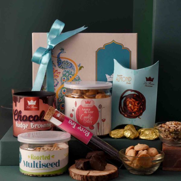 Let Festivity Begin Hamper with Brownie, multiseeds jar, cookie bites, tea tube & more