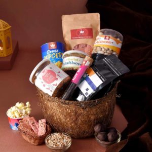 Best of Gourmet hamper with Tomato Multigrain Lavash,Cheese PopCorn Can , Atta & Gur Cookie Bites, Roasted MultiSeeds Jar, Revitalising Rose Tea Tube & other things in it
