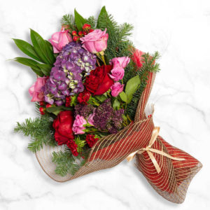 Boughs And Blossoms Bouquet of a flower assorted with Roses, Spray roses, Trachelium, Cocculos