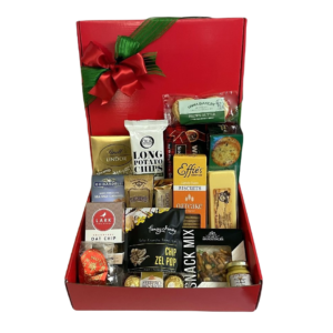 Corporate Festive Box contains Elki Spring Onion crackers, Gilman Swiss Cheese bar, Q’s Nuts Maple Bourbon Pecan shown, Ferrero Rocher Trio, Mini Mustard flavor, & other things in it