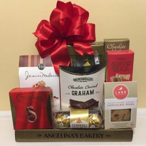 Festive Stack hamper with some chocolates, cookies, fruit jellies & other things in it