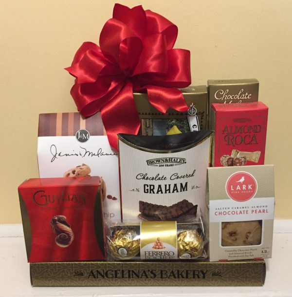 Festive Stack hamper with some chocolates, cookies, fruit jellies & other things in it