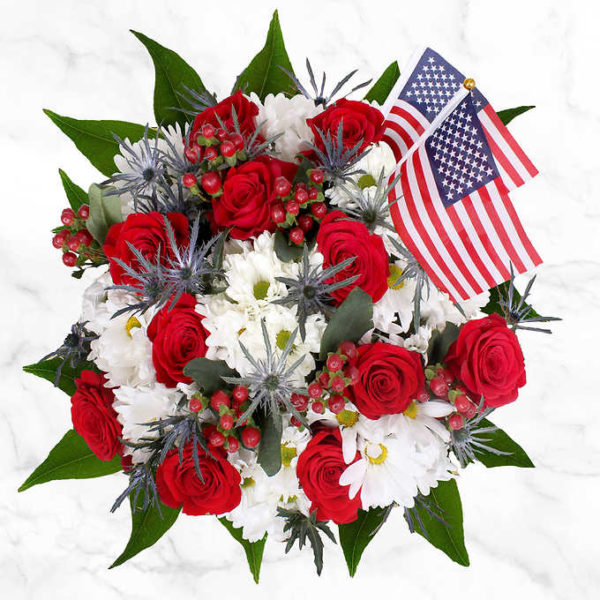 Patriotic Floral Arrangement with a beautiful tribute of blooms in red-white & blue.