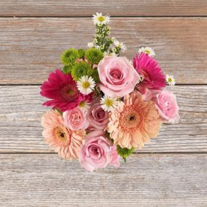 I Heart You - Bright bouquet of pink gerberas and roses with ruscus and white aster.