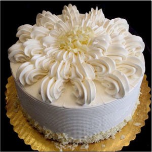 Designer Vanilla Cake with some great designing done on the top