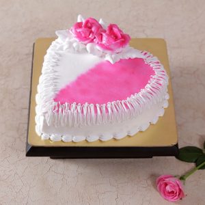 Eggless Butter Cream Strawberry Cake in a heart shape