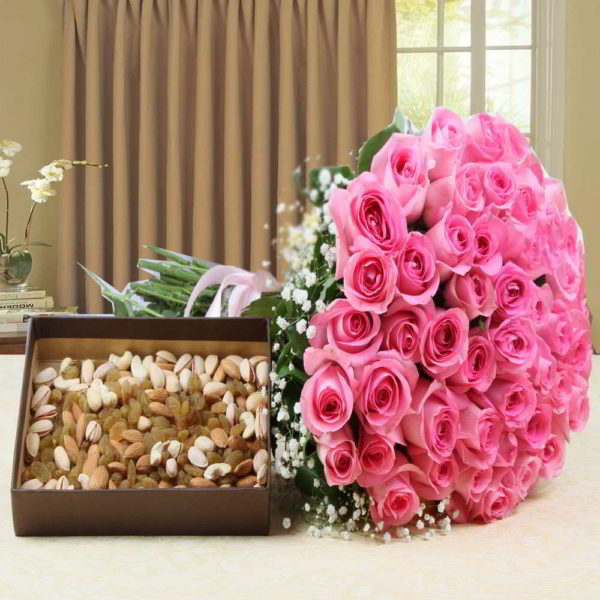 Hand Bouquet Pink Roses with Assorted Dry Fruits - Same Day Delivery