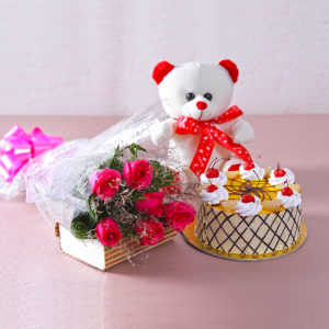Bouquet of 6 Pink Roses with delicious Butterscotch Cake and a Cuddly Bear